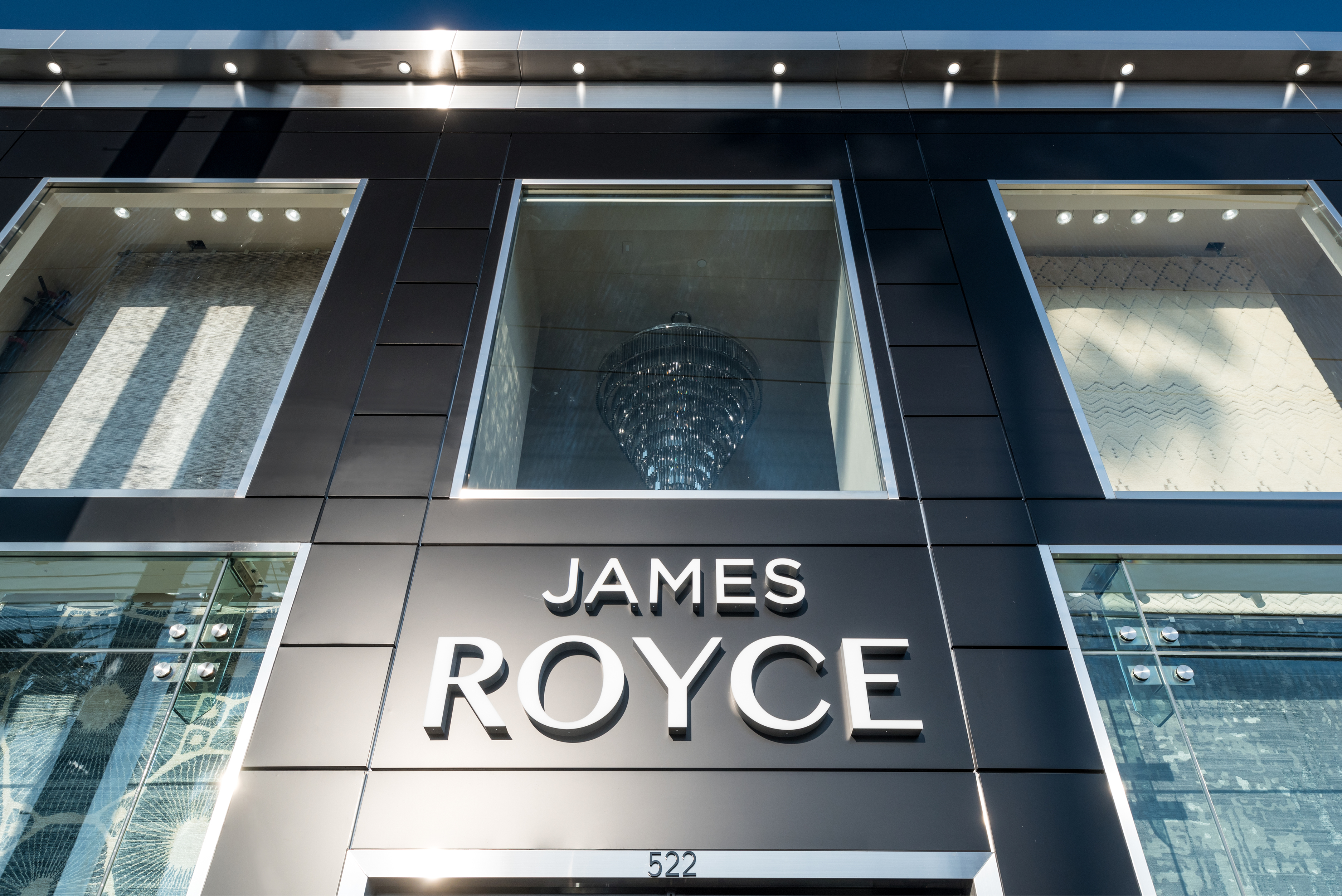 A new storefront for James Royce Rug Gallery shines bright in ALPOLIC MCM TOB Black and Stainless Steel
