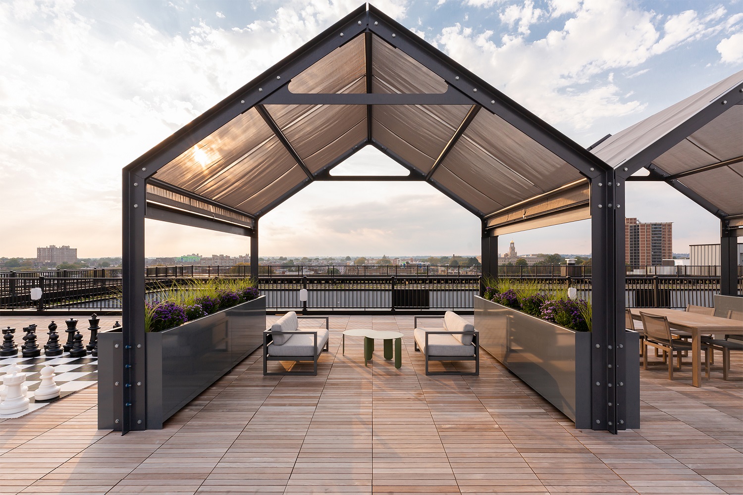 Stylish rooftop with cabana seating areas, giant chess board and views of the Philadelphia skyline.