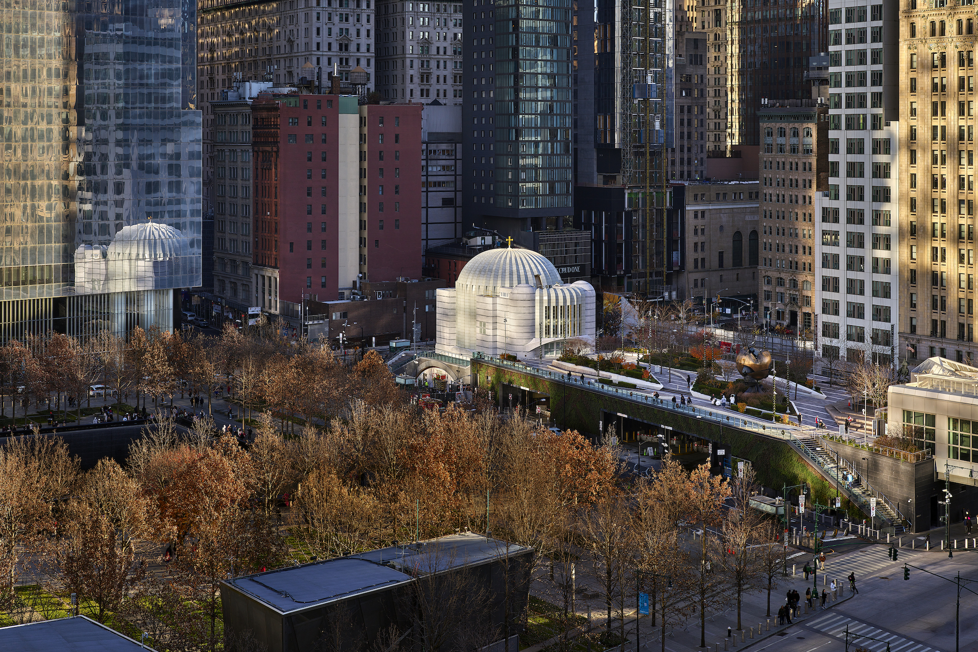 St. Nicholas Greek Orthodox Church and National Shrine glowing in light reflected from One World Trade Center - Photo(s) © Alan Karchmer for Santiago Calatrava