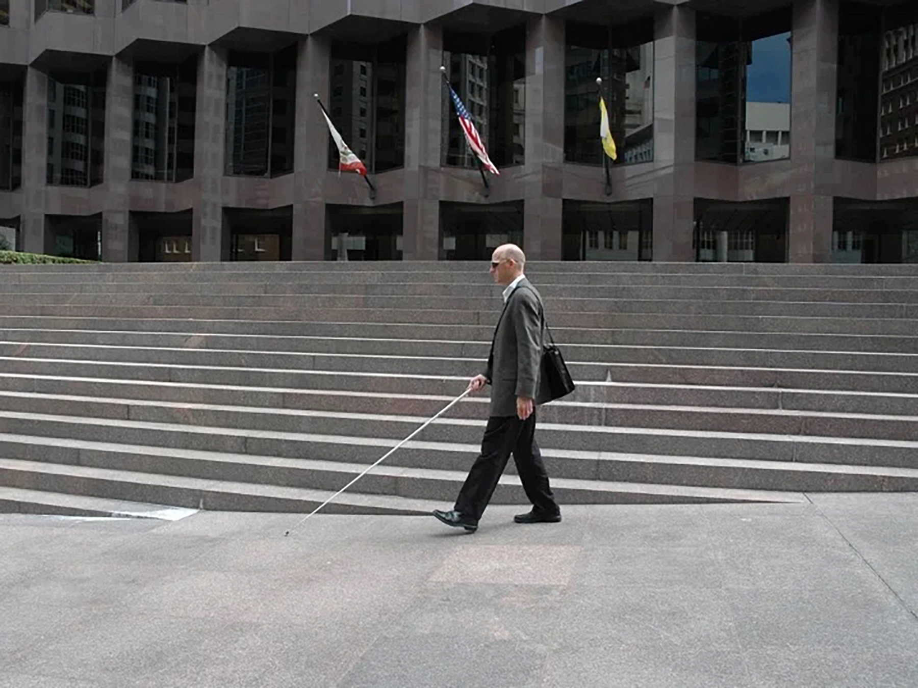 Architect Chris Downey navigates a sidewalk in San Francisco