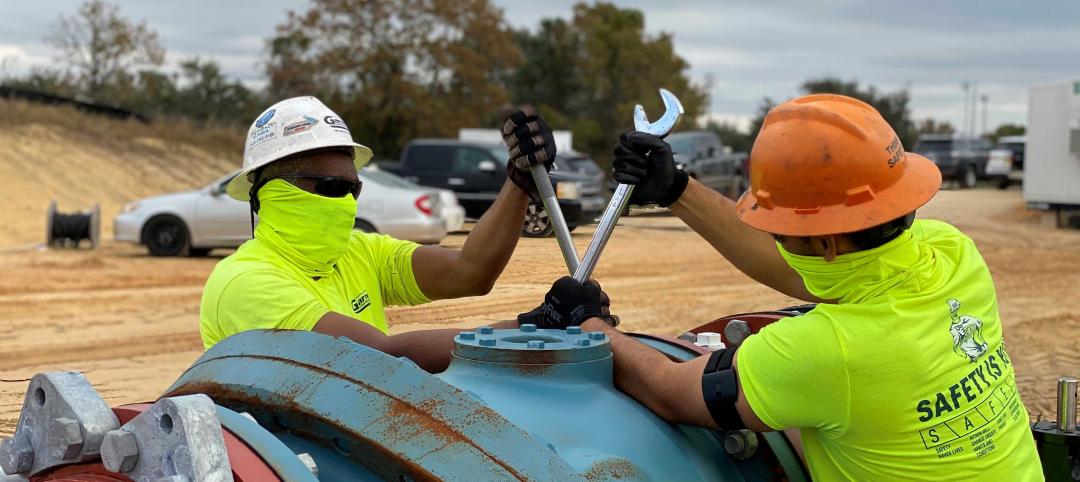 Garney Construction workers wearing Kenzen heat stress devices on their arms