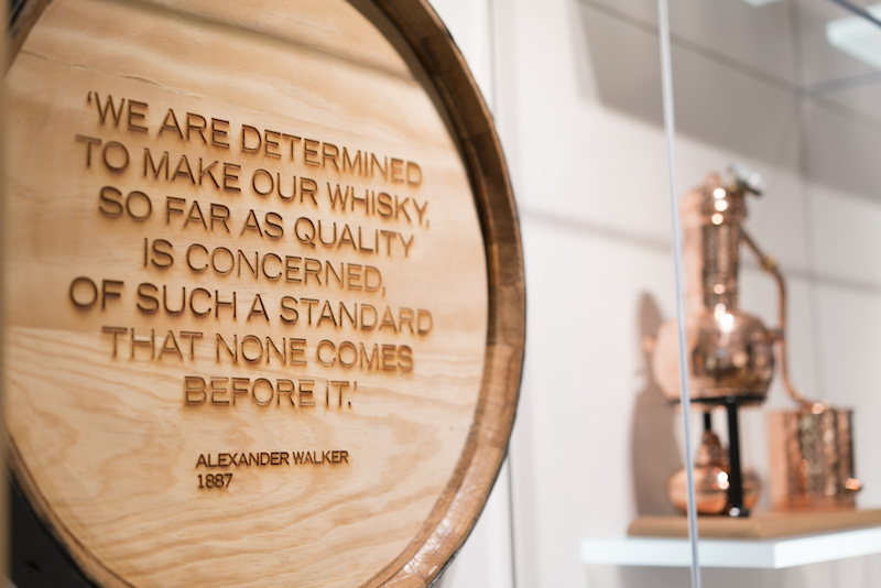 Whiskey barrel with an Alexander Walker quote on it