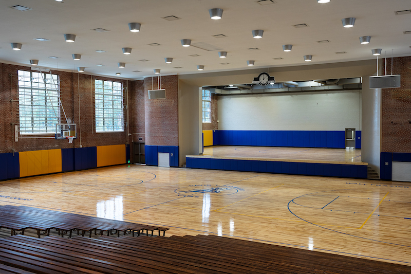 David T. Howard School gymnasium and stage after rehabilitation