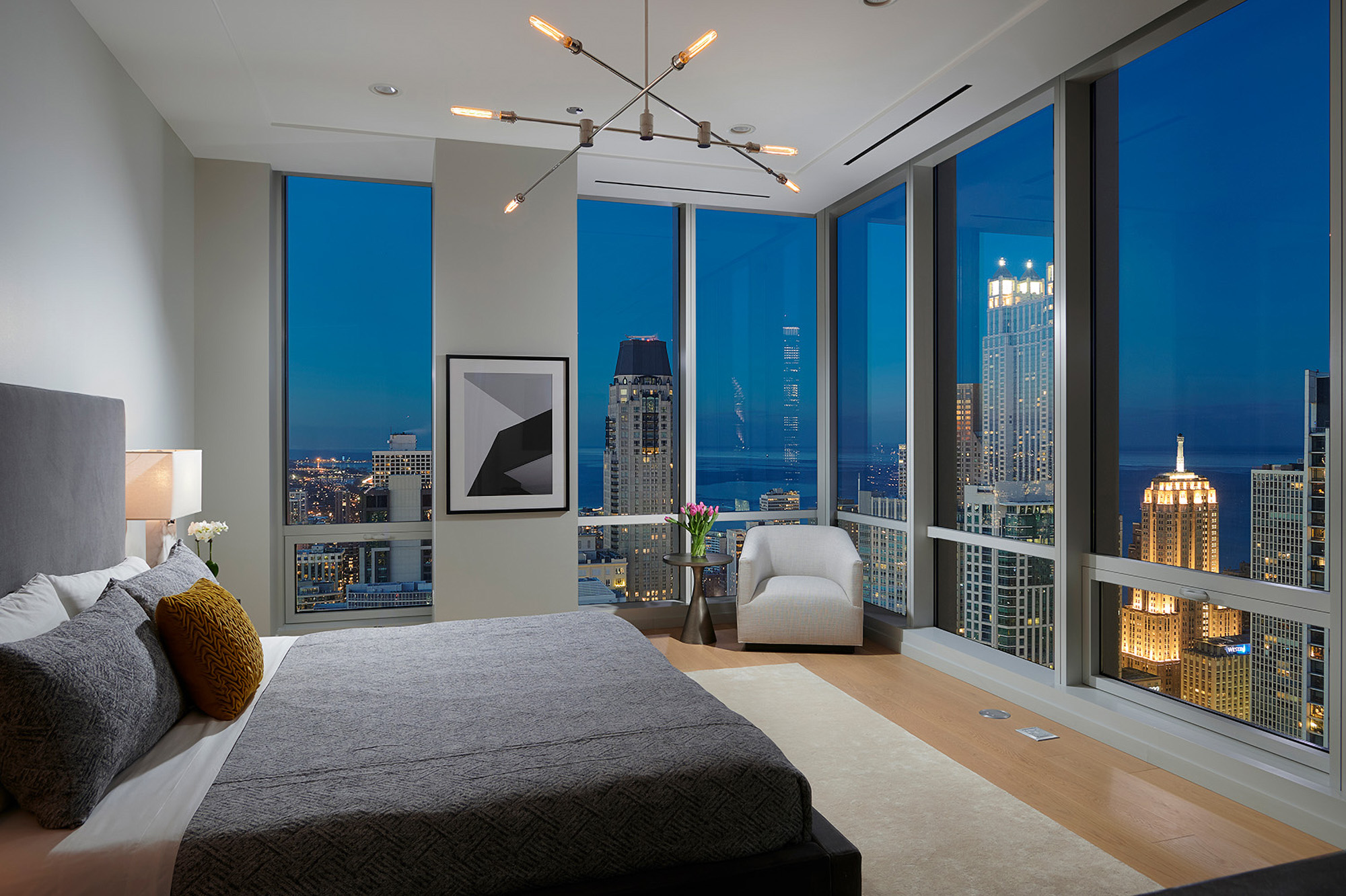 Main bedroom in a One Chicago high-rise apartment.