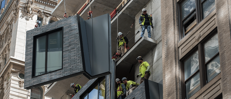 A Consigli crew installing a prefabricated facade