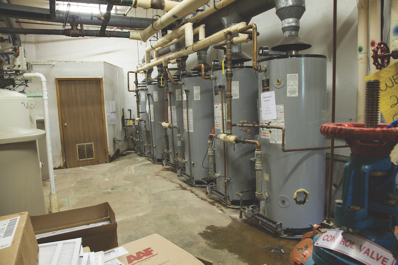 Old conventional water heaters at Culver Cove, Inc., condominiums