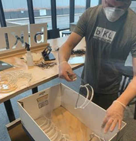 bKL staff pack face shields for delivery to Chicago healthcare workers