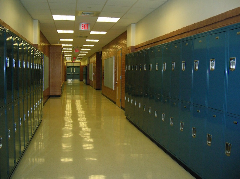 Lockers lining a high school hallway