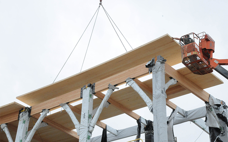 Engineered wood products and mass timber can be ordered in custom and longer lengths and even pre-cut framing packages, all of which help reduce construction waste.