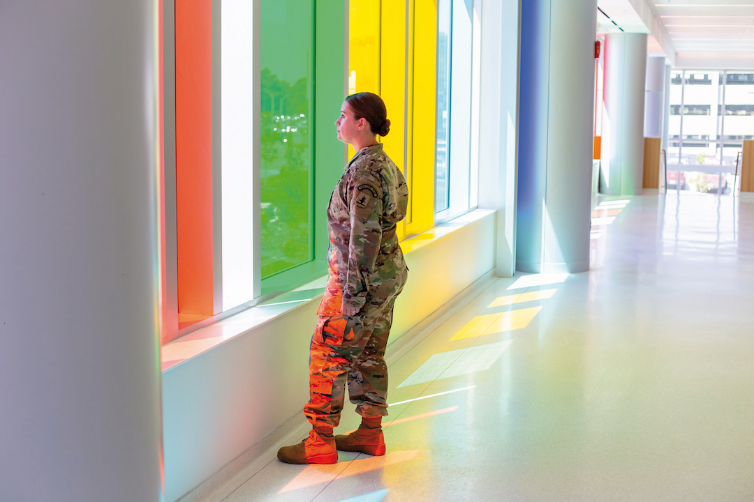 Female army vet in hallway 