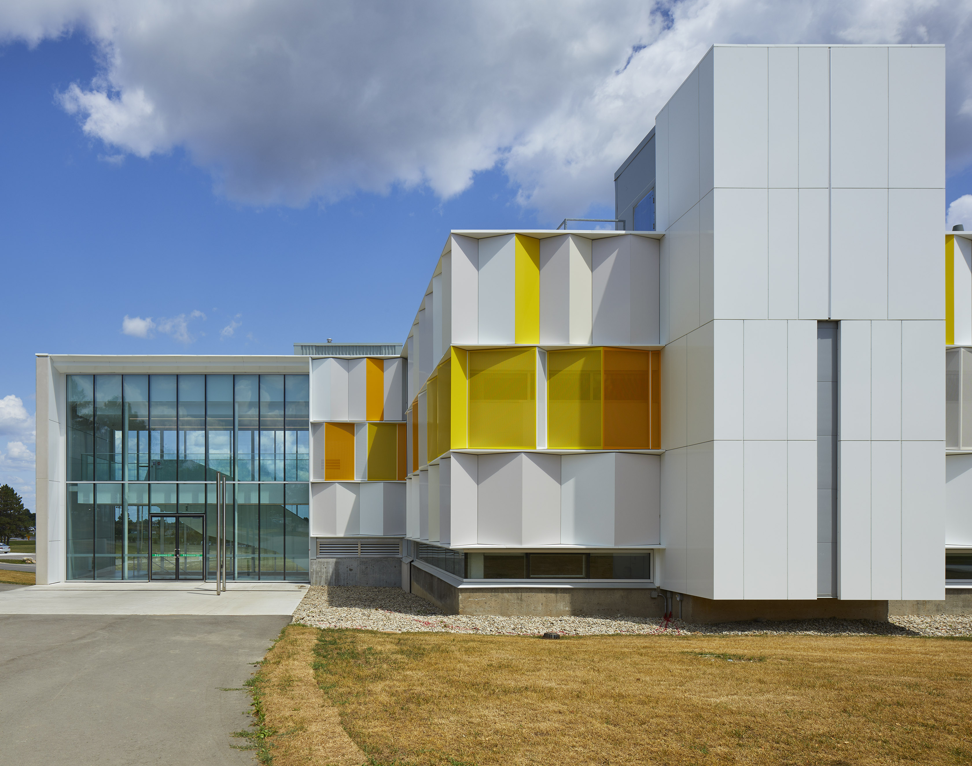 ALPOLIC MCM cladding on the renovated envelope of Fleming College A Wing building, installed at angles for aesthetic design
