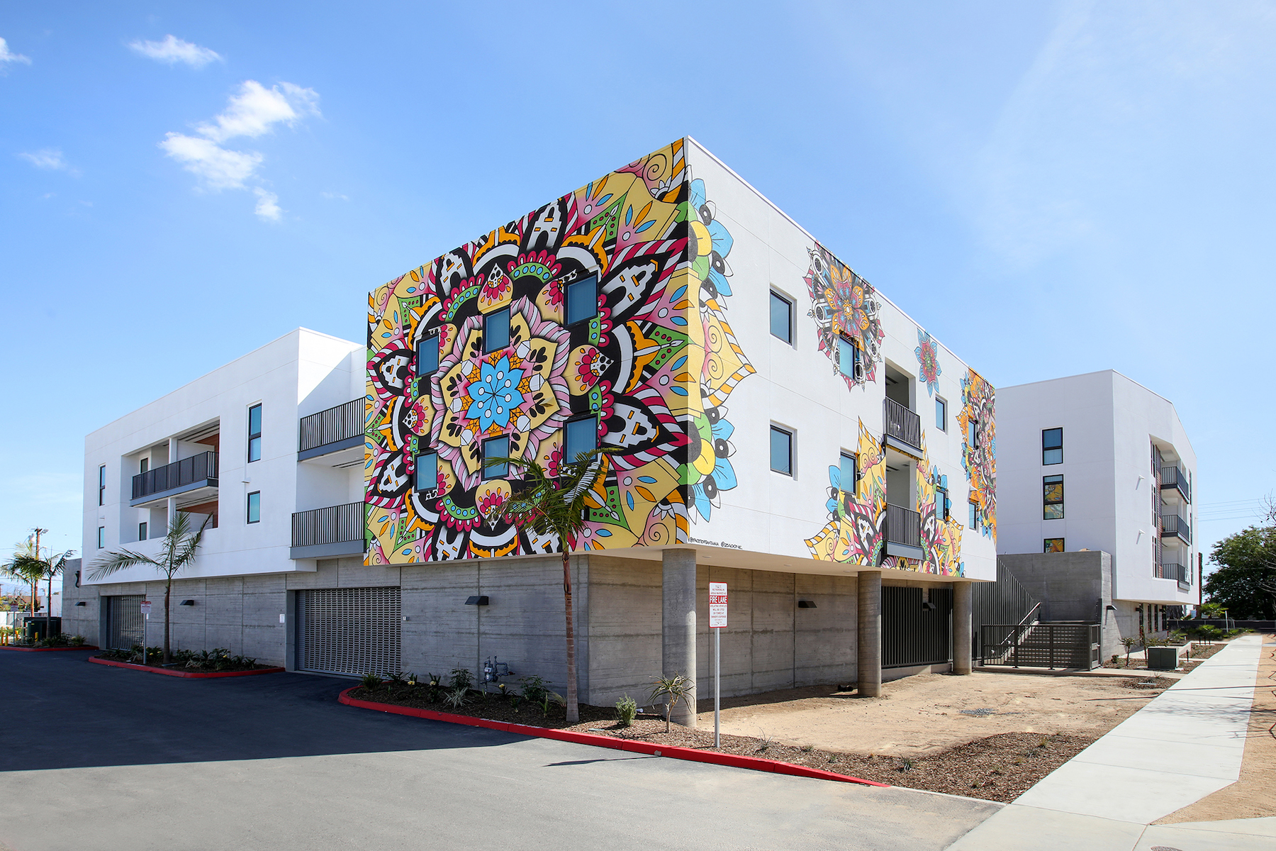 Photo courtesy TCA Architects La Placita Cinco, Santa Ana, Calif. Placita facade - mural2.jpg