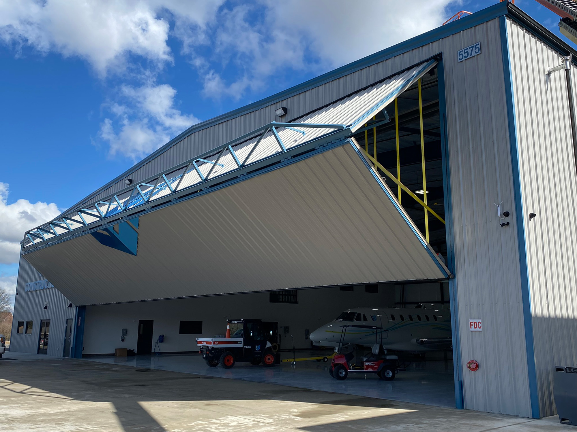Schweiss bifold airplane hangar door