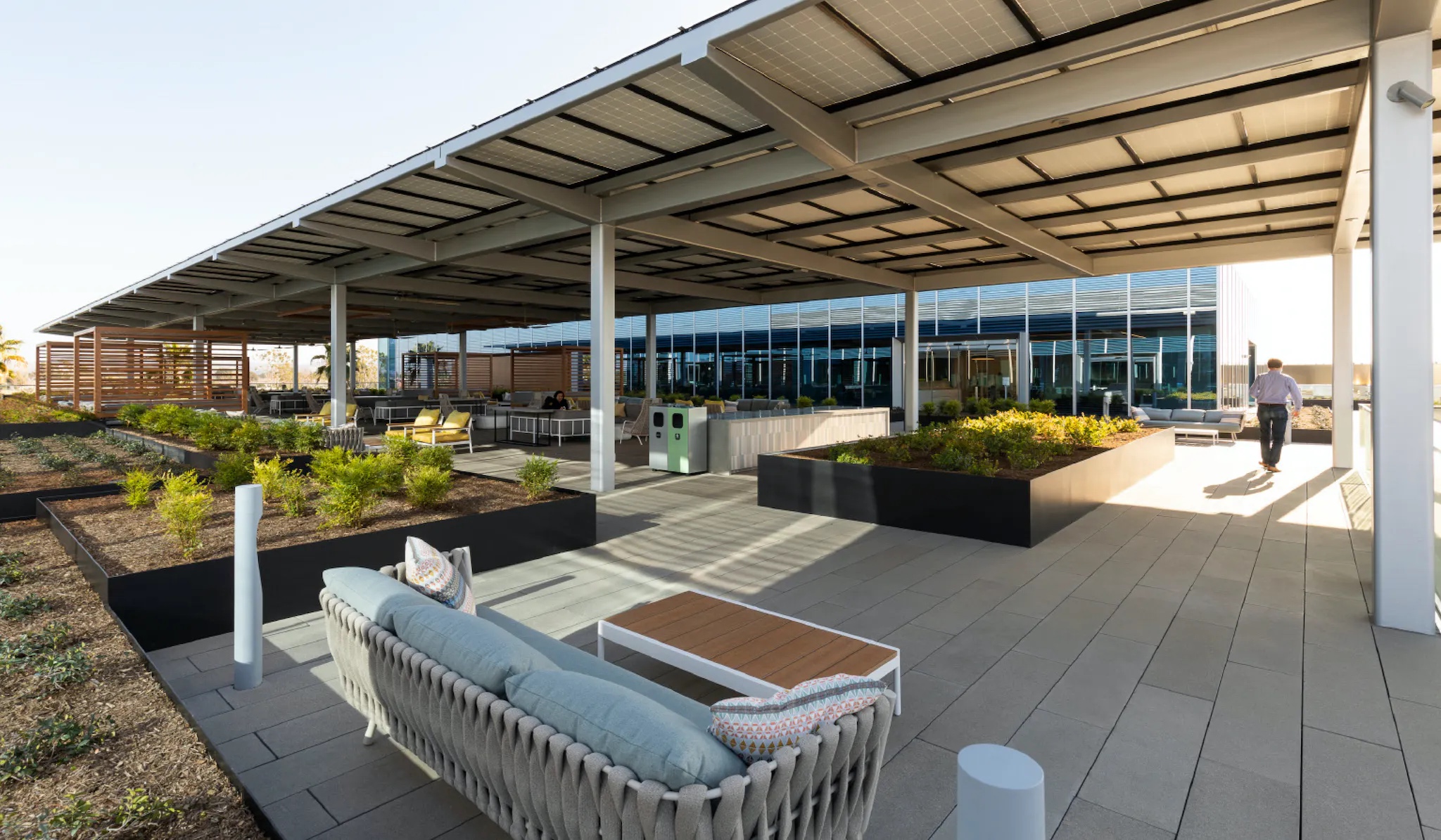 Edwards Lifesciences expansion project uses PV panels to shade outdoor collaborative areas on the third floor deck.