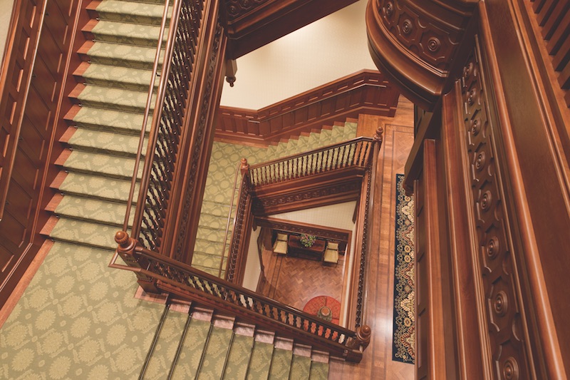 A carved wood staircase
