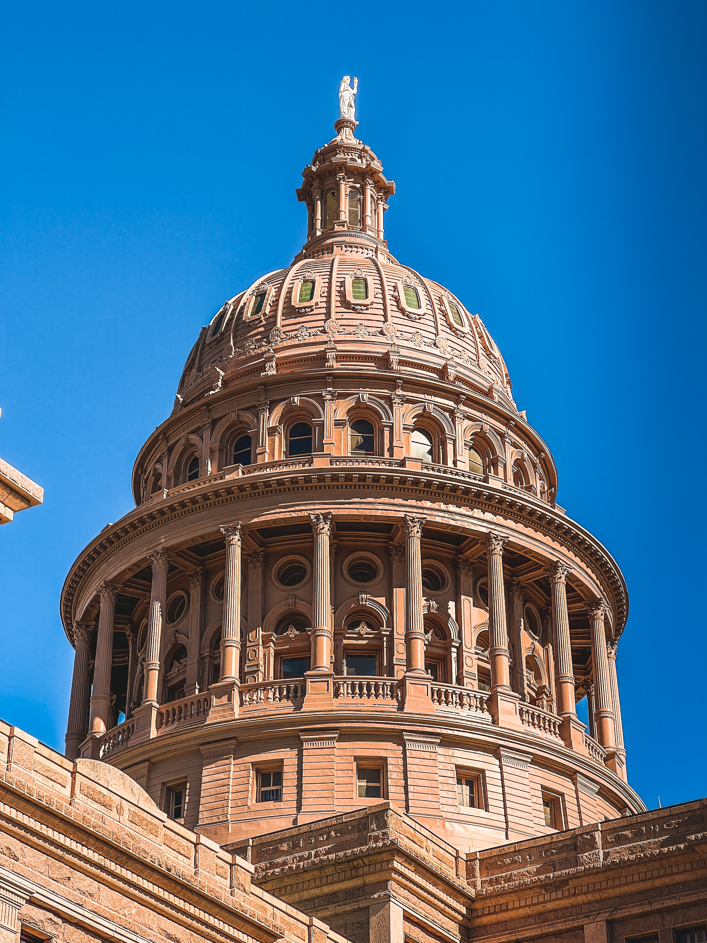 Top 50 State Government Building Construction Firms for 2023 - Texas Capitol, Congress Avenue, Austin. Photo by Prasad Panchakshari on Unsplash
