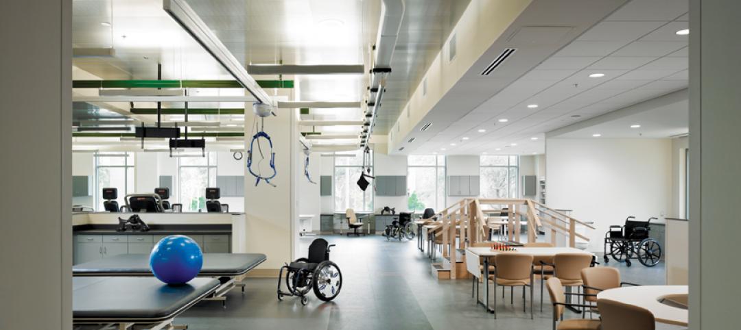 Metal tiles were used in the physical therapy gymnasium to give the space a more