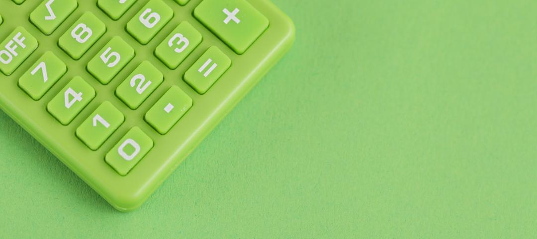 Green calculator on Green background. Copy space. Environmental, Social, Corporate Governance.