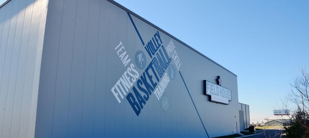 Two separate metal gym buildings accommodate a total of four full-size basketbal