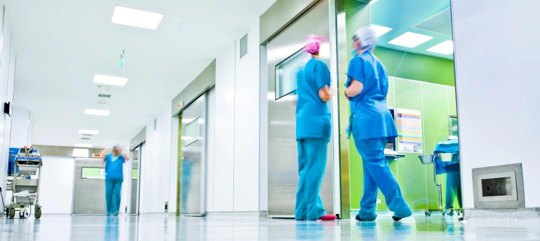 Nurses in bright hospital hallway
