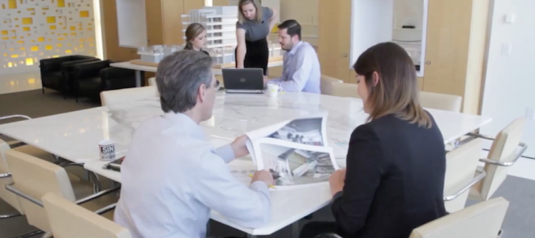 Five people work together in a PDR office meeting space