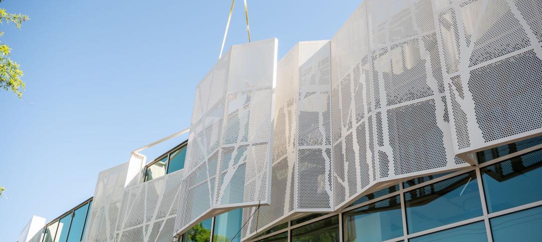 Exterior scrim being placed onto Lamond Riggs/Lillian J. Huff Library in Washington.